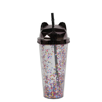 Cat-themed glitter tumbler cup with a straw